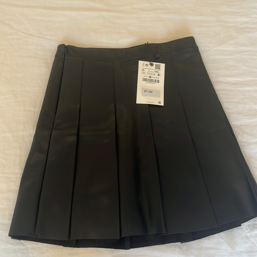 Black leather girls skirt